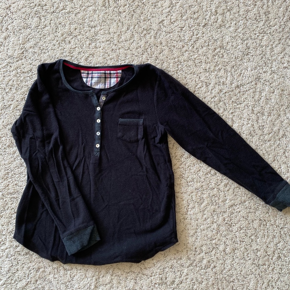 Pajama Shirt made out of a cotton-based material.